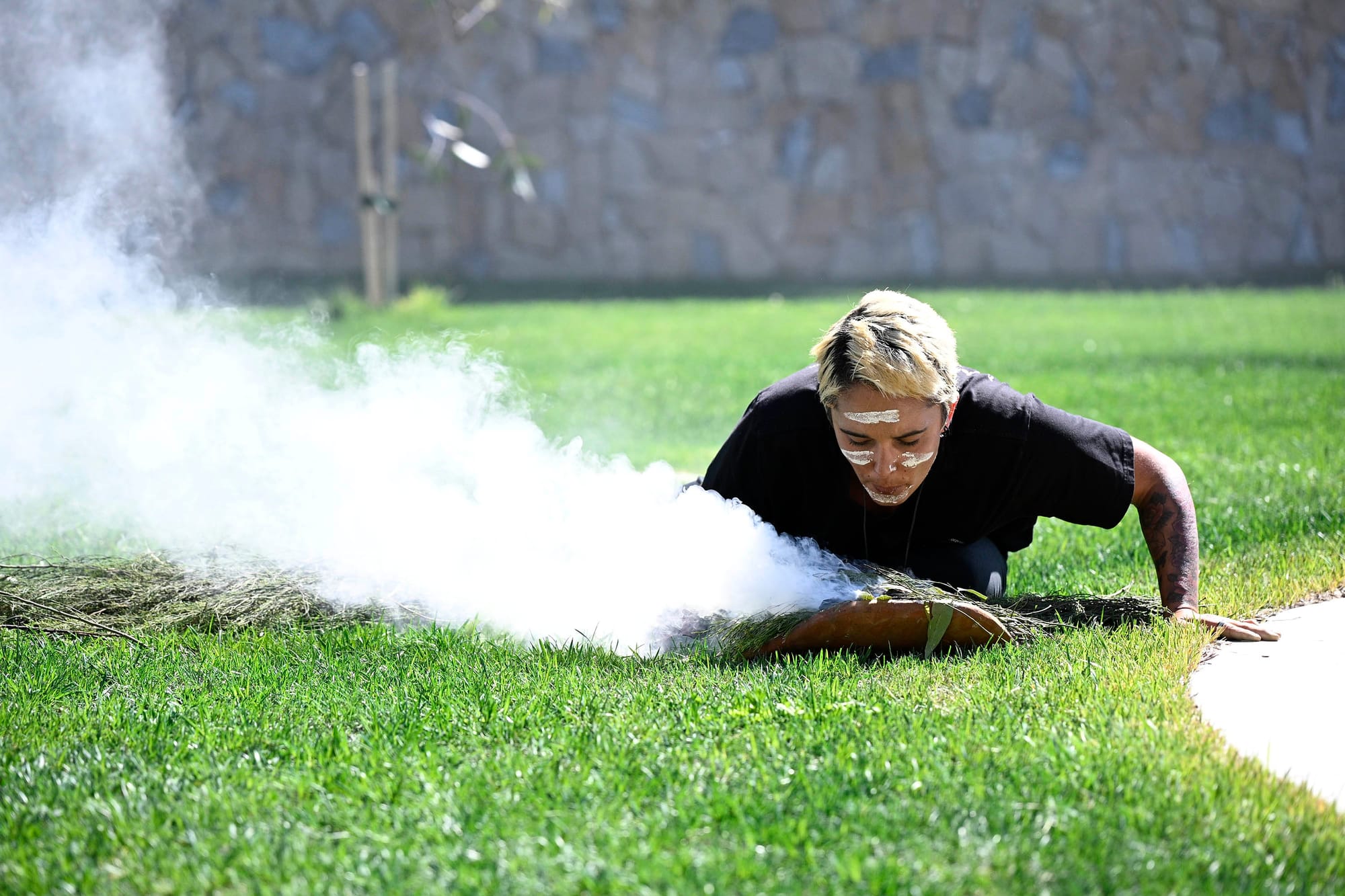 The Welcome to Country smoking ceremony.
