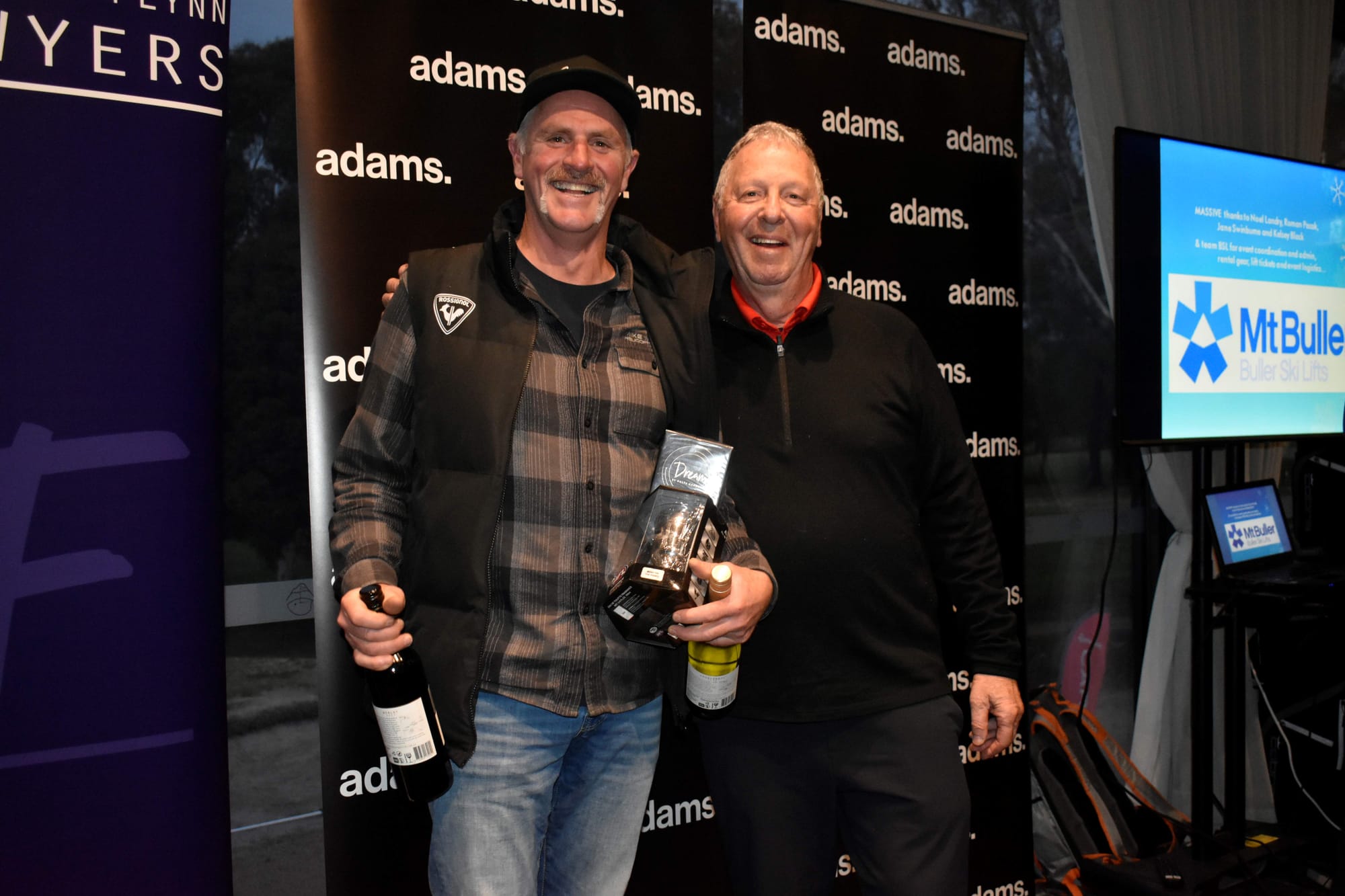 NTP WINNER: Rob Aivatoglou with his prizes after winning a nearest the pin on the 16th tee - with Mark Adams.