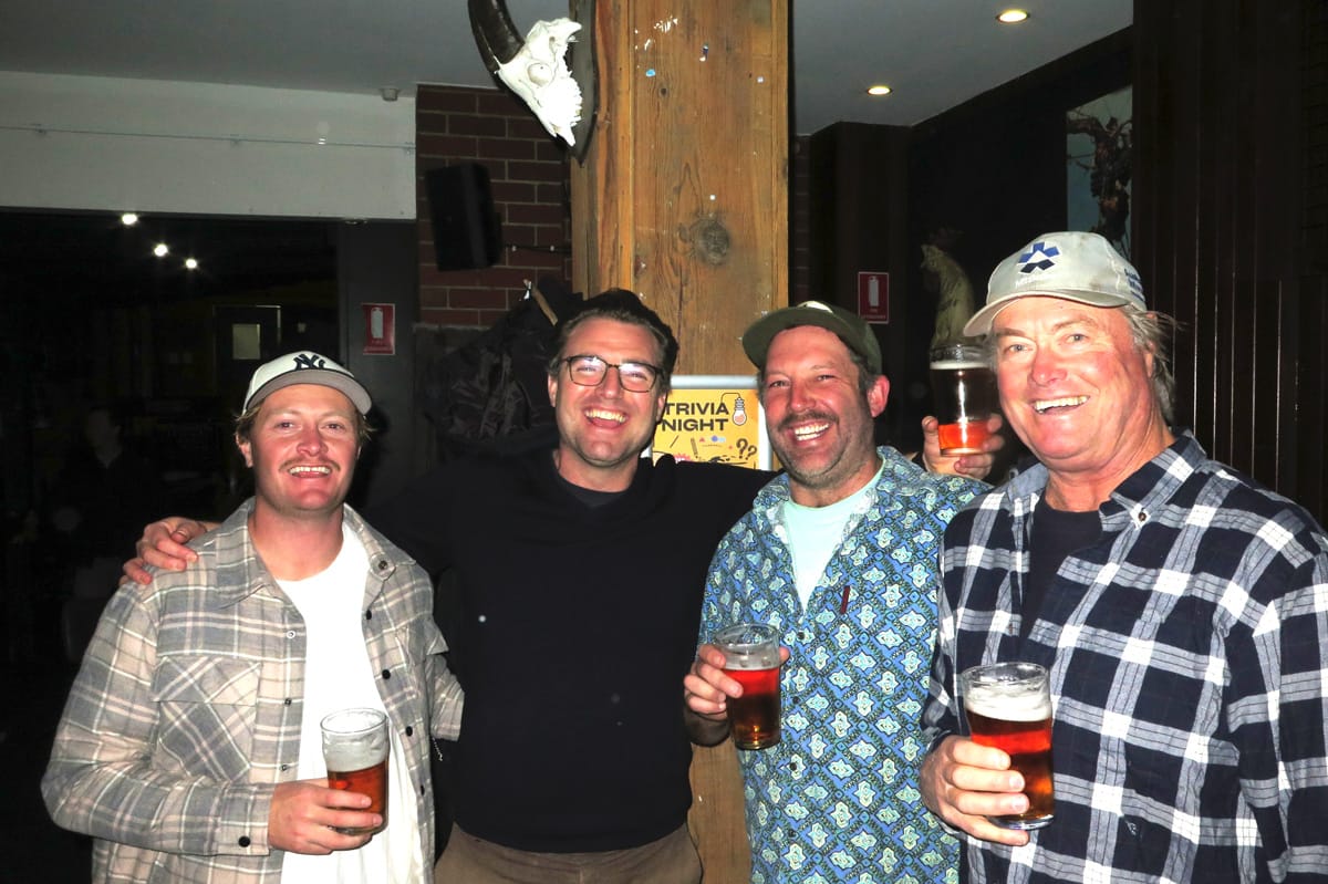RAISING GLASSES AND MONEY: Charlie Horton, Henry Dobson, Mark Foletta, Peter Horton.