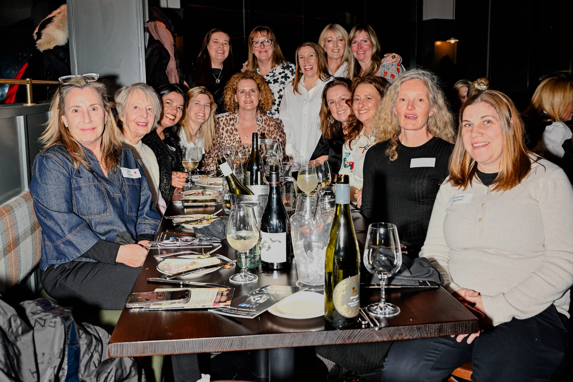 ALL GIRLS: A table of ladies all happy to be there.