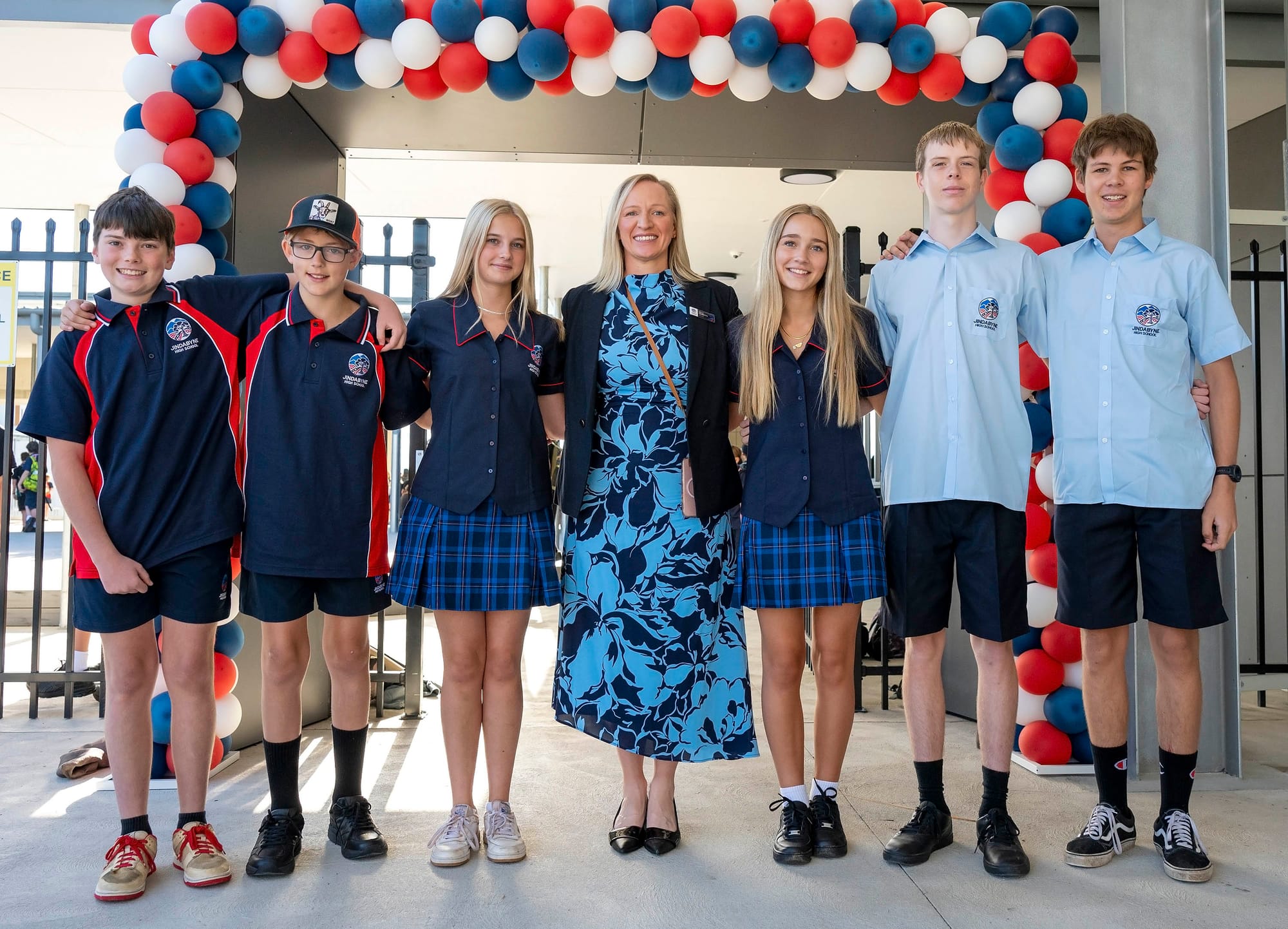 Jindabyne High School principal Kelly Henretty with junior and senior high school students.