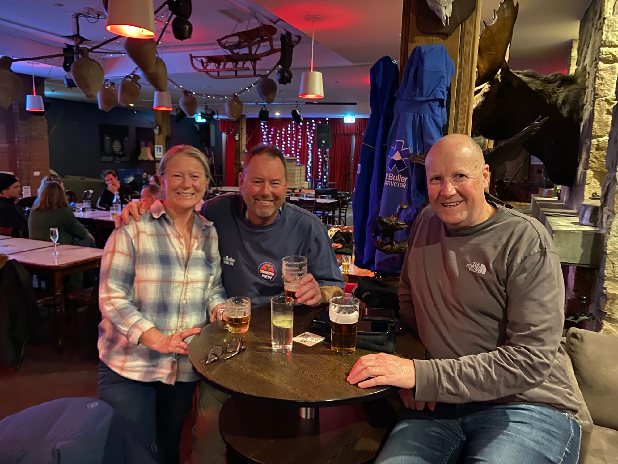 CHEERS TO 100 YEARS: Tracy daw, Justin Carmody and Nigel Buchanan.