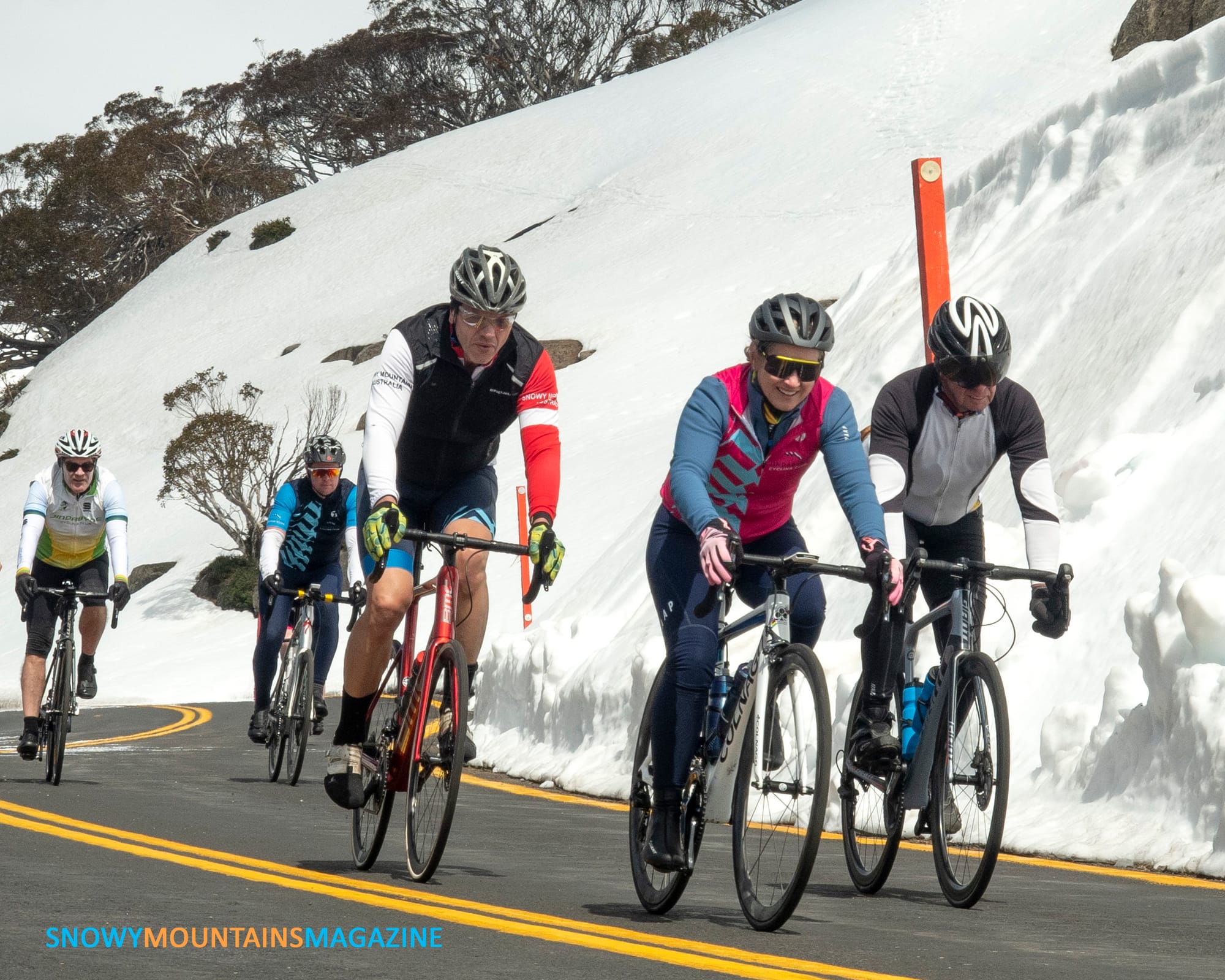 A small group of riders start the journey downhill from the lookout.