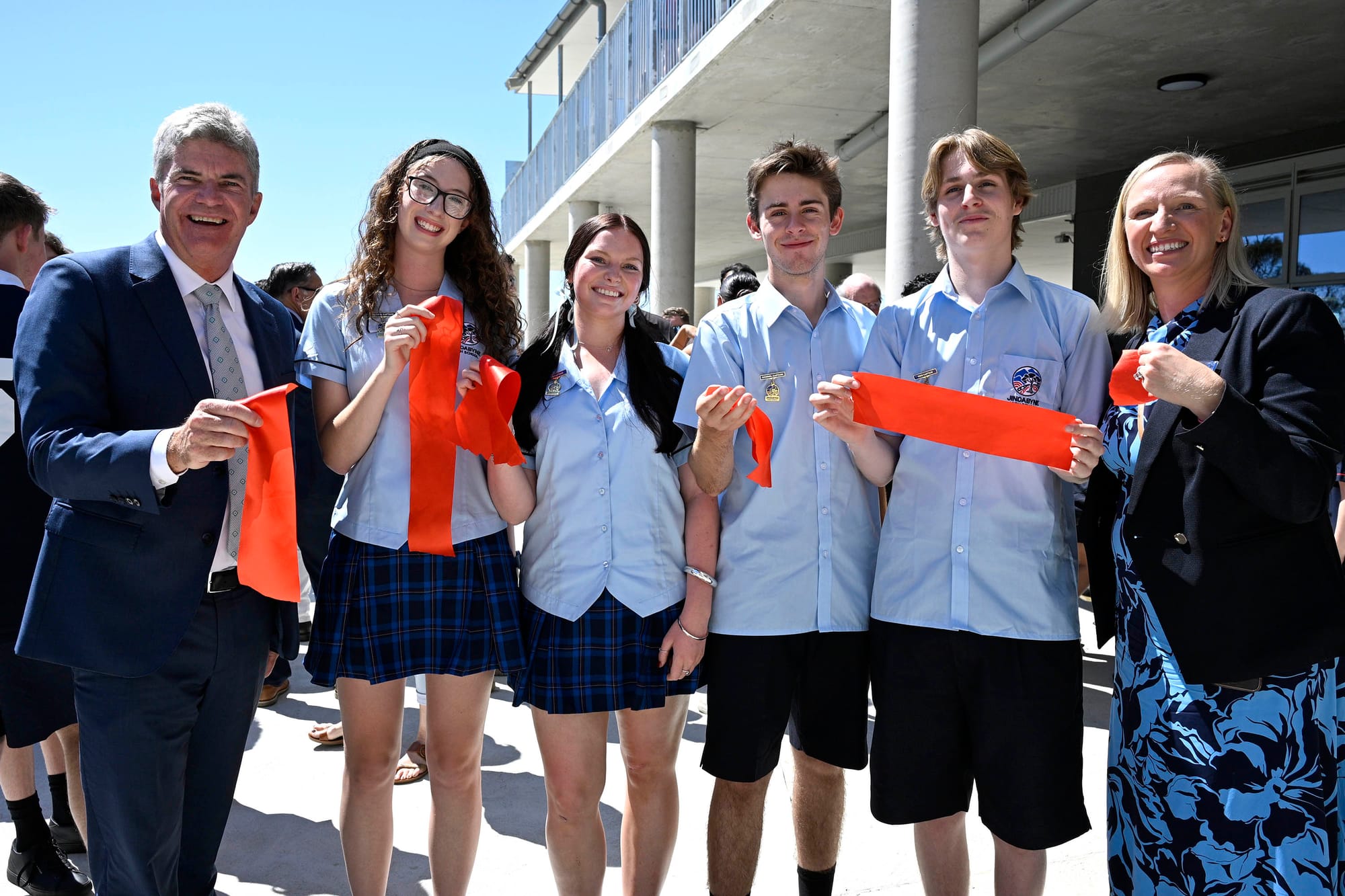 (l to r) Member for Monaro Steve Whan, Hunter Clark, Poppy Golby, Ryan Anderson, Hugh Cooper and Jindabyne High School principal Kelly Henretty with cuttings from the official opening ribbon.