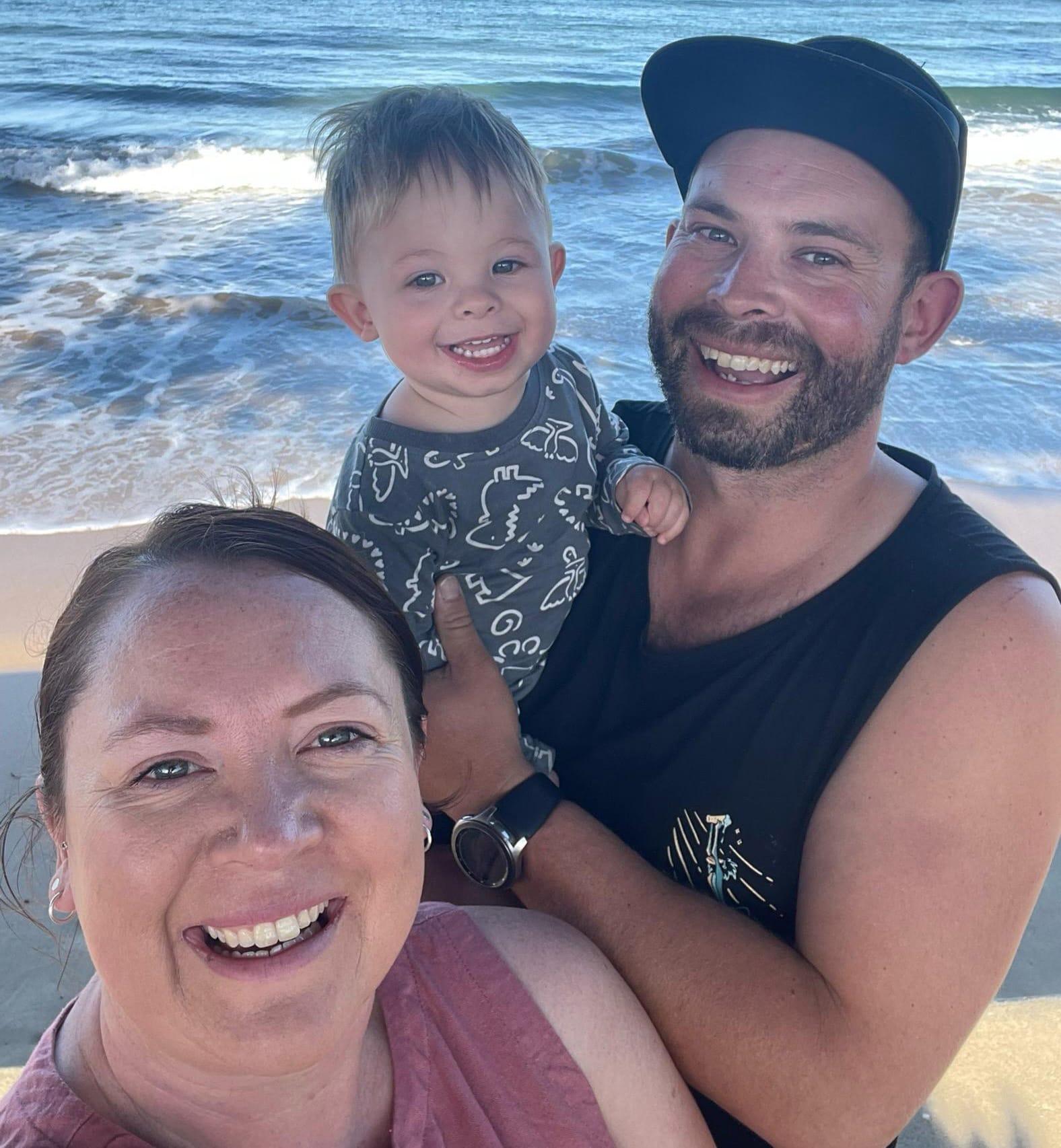 FAMILY TIME: Ben Harvey, partner Sabrina and their son Oliver enjoy some time at the beach, away from the mountain life.