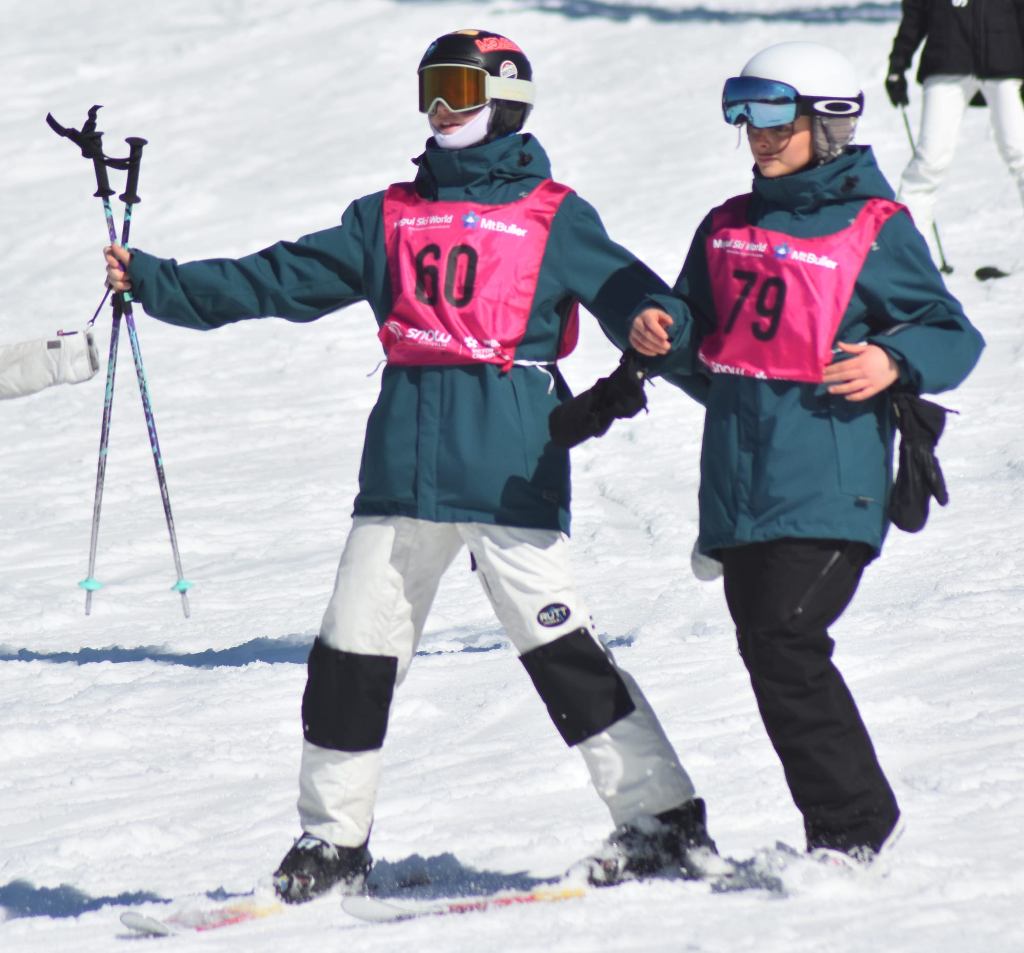 ALL DONE: Friends Laura Bryne (Toorak College) and Holly Rice (Lauriston) caught up after finishing their Giant Slalom run and returning to their home base. PHOTO: Pam Zierk-Mahoney