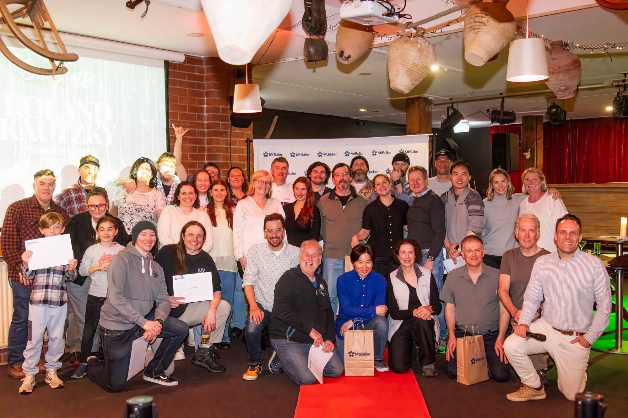 COMBINED WORKFORCE: Recipients were happy to pose for a group photo. 