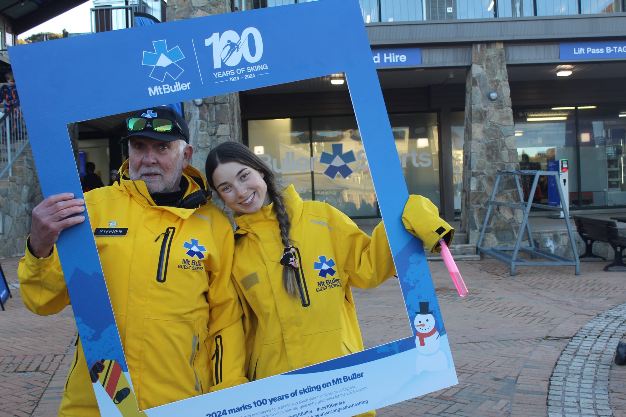 SAY CHEESE: Mt Buller workers celebrate 100 years of skiing. 