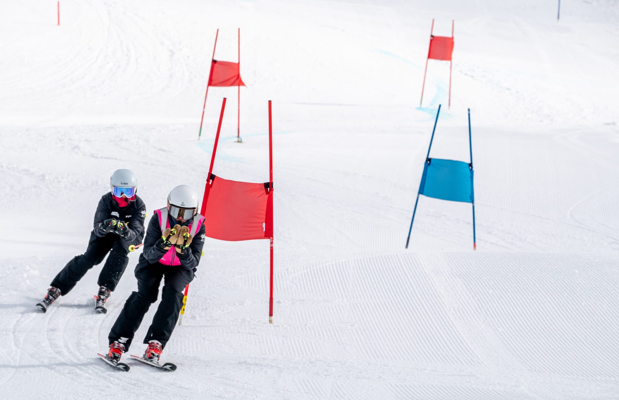 PURE SPEED: Amelia Hodgson guides visually-impaired skier Georgia Gunew through the slalom course. PHOTO: Vail Resorts