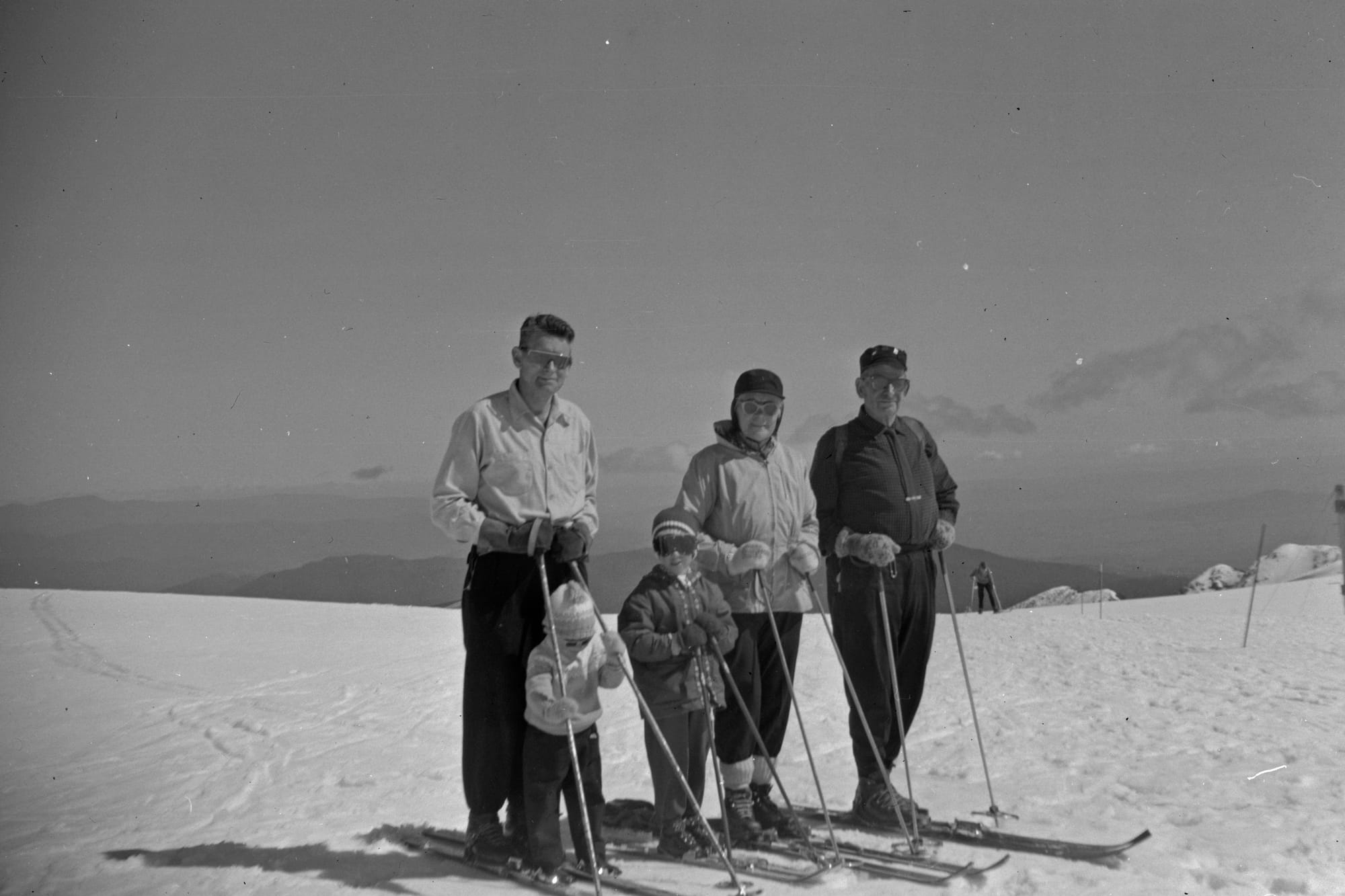 THREE GENERATIONS: Merrick Summers, Jane Phillips (two years), Gill Summers (five years), Laura Summers and Rob Summers skiing on Mount Buller in 1961. PHOTO: Supplied.